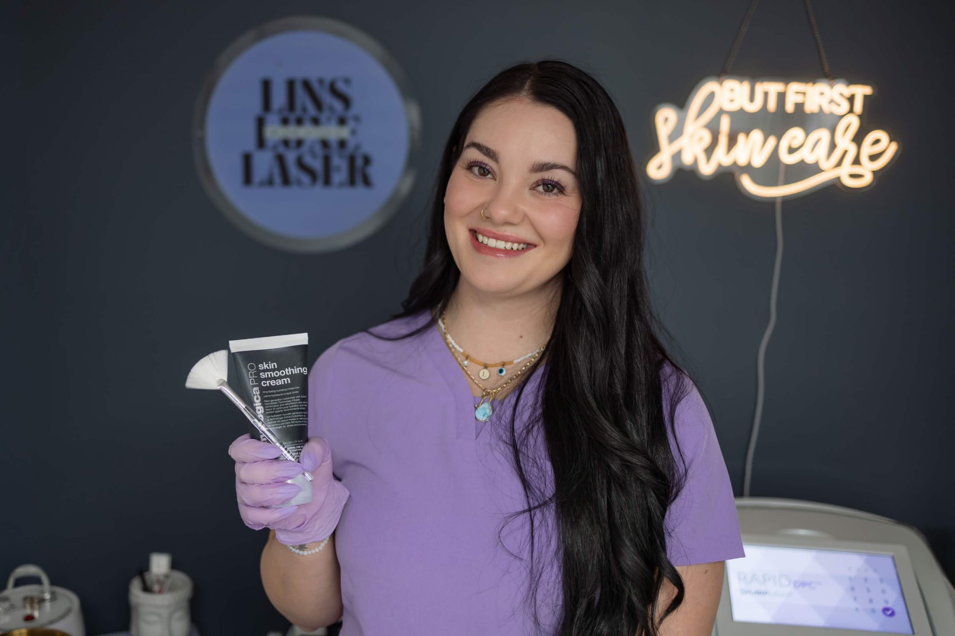 Lins holding Dermalogica skin smoothing cream